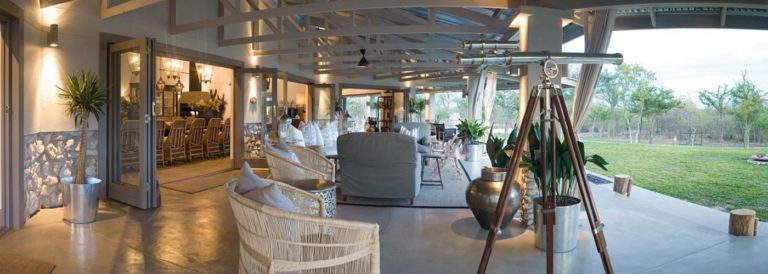 Featured Mushara Outpost lounge with garden views