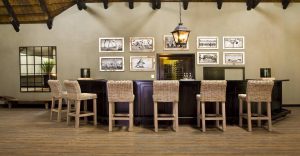 Bar and gallery wall at Mushara Lodge