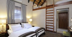 Twin room with children’s loft at Onguma Bush Camp