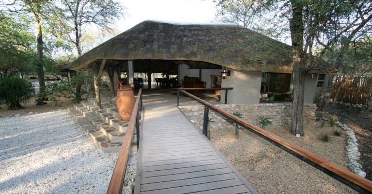 lodge near Etosha – wooden entrance bridge to the lodge
