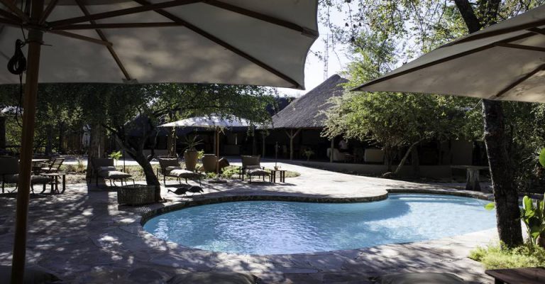 Etosha safari lodge – shaded swimming pool and lodge deck