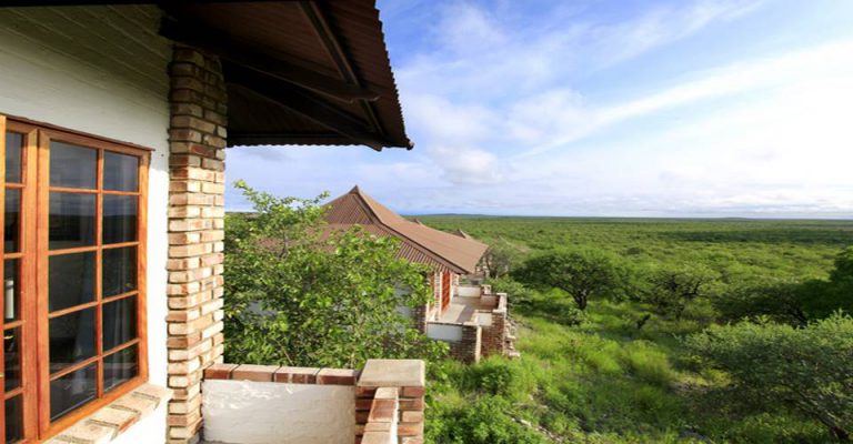 Hilltop room veranda overlooking southern Etosha woodland