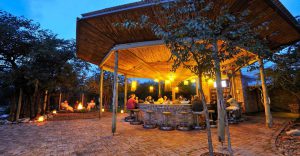 Outdoor bar and fire area at Etosha Village