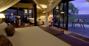 Little Ongava bedroom opening to a private viewing deck