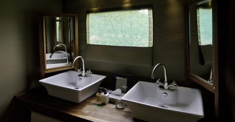 Double vanity bathroom in an Ongava Tented Camp tent