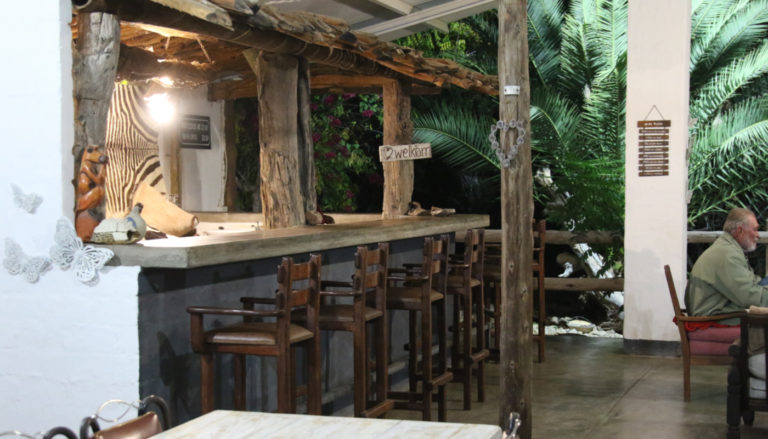 Eldorado Lodge Etosha – rustic bar and restaurant counter
