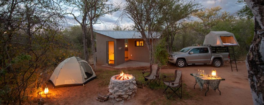 Onguma campsite with tent, campfire and private ablution