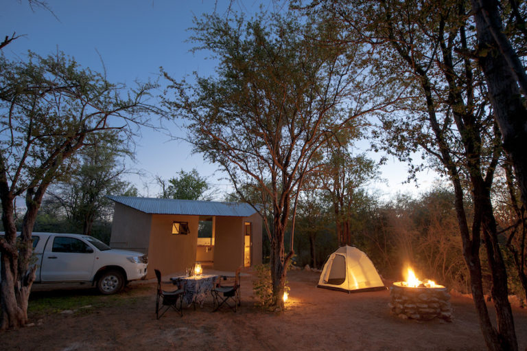 Tamboti Luxury Campsite stand with private ablution and campfire