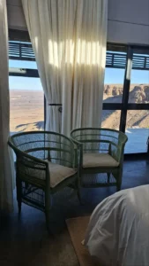 Chalet seating area with canyon views at Fish River Lodge