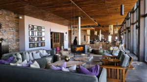 Lounge seating and dining area inside Fish River Lodge