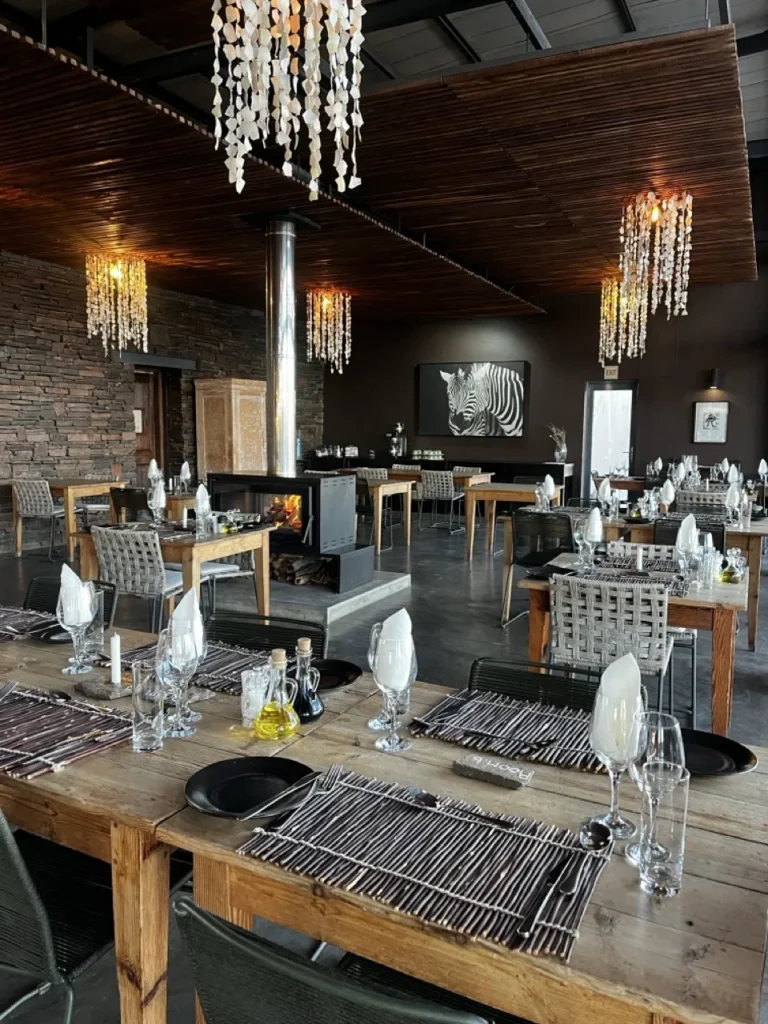 Tables set for dinner in the Fish River Lodge restaurant