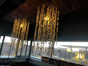 Hanging decorative lights in the Fish River Lodge dining area