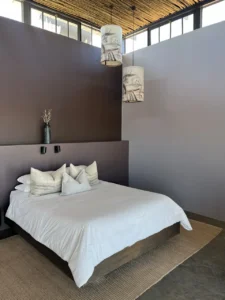 Double bed in a Fish River Lodge chalet