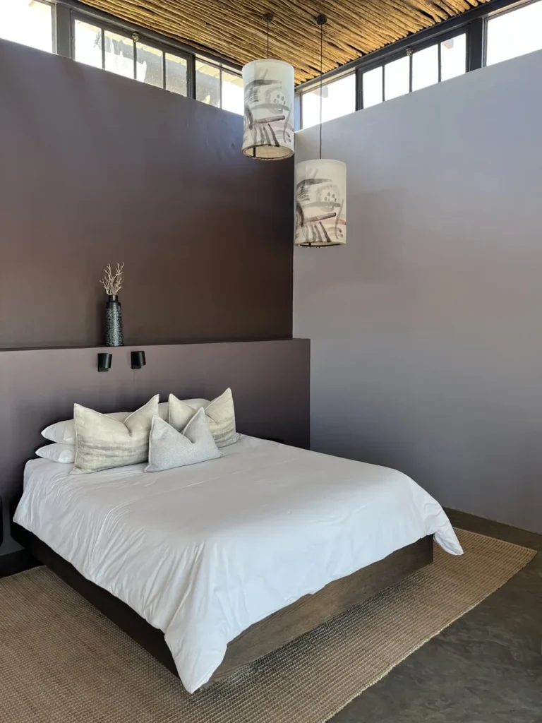 Double bed in a Fish River Lodge chalet