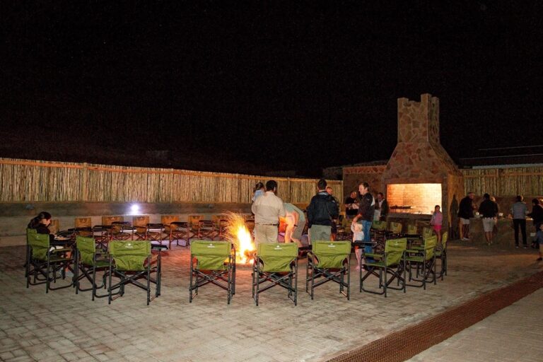 southern Namibia accommodation – campers gathered around an evening fire
