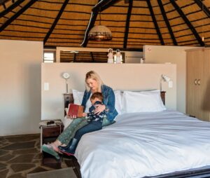 C27 lodge Namibia – double suite beneath a thatched roof