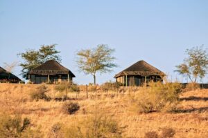 southern Namibia accommodation – round thatched guest units in the grassland