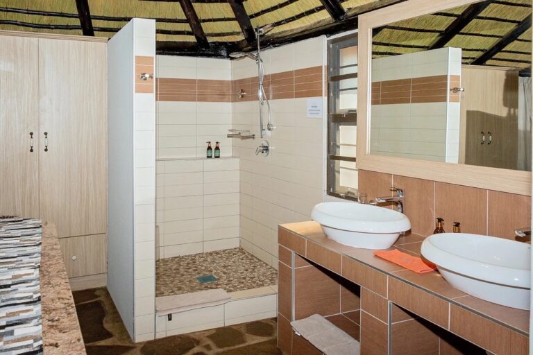 Kronenhof Lodge – modern en-suite bathroom with double vanity