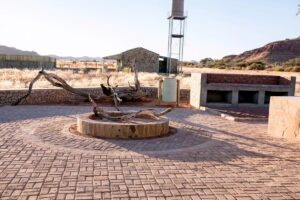 Kronenhof Lodge – private campsite bathroom and fire area