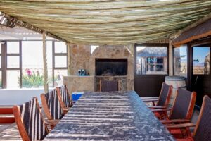 At Kronenhof Lodge – long shaded group dining table