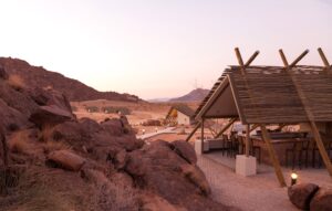 Desert Quiver Camp – open-sided bar among granite rocks