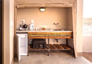 Sesriem self-catering accommodation – fitted patio kitchenette with fridge