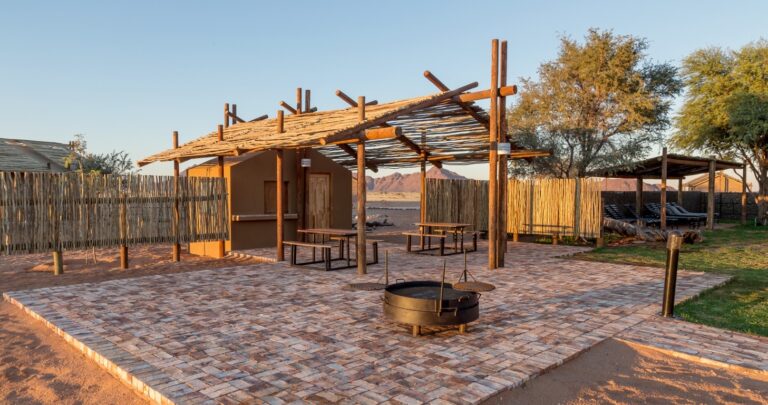 Desert Camp Sesriem – communal boma with central fireplace