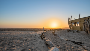 Shipwreck Lodge Namibia – shipwreck-inspired cabins at sunset