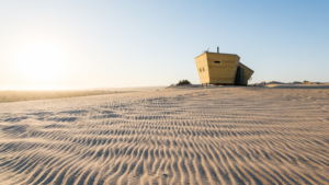 Skeleton Coast lodge – remote cabin among rippled dunes
