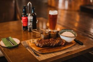 Strand Hotel Swakopmund – restaurant steak dinner and craft beer