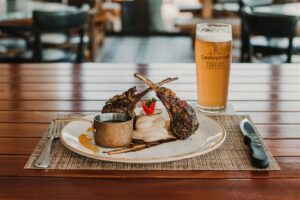 Swakopmund beachfront hotel – meat dish paired with a local beer