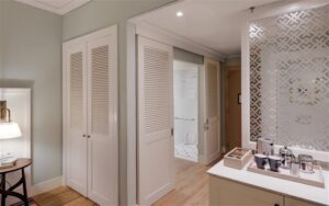 Strand Hotel accommodation – en-suite vanity and walk-in shower