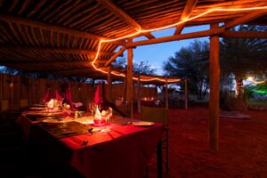 Bagatelle Kalahari Game Ranch – evening meal on the terrace