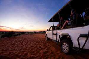 Kalahari lodge near Mariental – game drive across red dunes