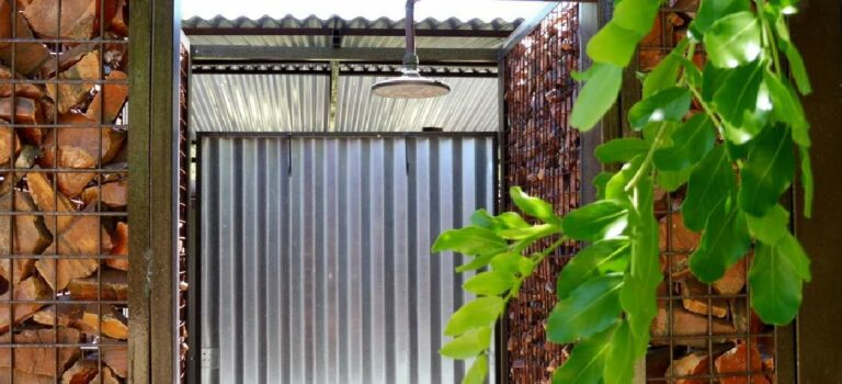 Richtersveld camping – outdoor shower surrounded by greenery