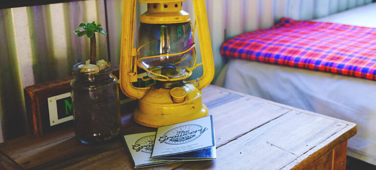 Vioolsdrift accommodation – lantern beside a Chic Shack bed