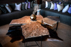 canyon rim accommodation – stone coffee tables in the lounge