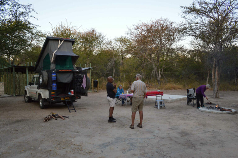 Khaudum Sikereti Camp – campers preparing their site in the bush