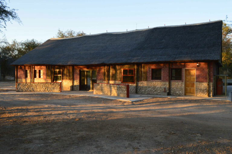 Khaudum National Park accommodation – thatched communal lodge building
