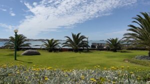 Lüderitz seafront hotel – green hotel lawns beside the sea