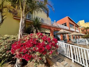 Lüderitz seafront hotel – colourful hotel exterior and terrace