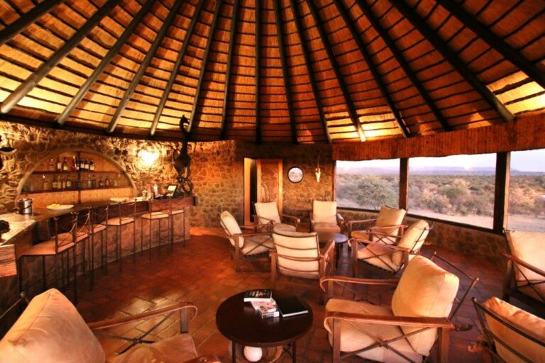 Okonjati Game Reserve lodge – circular lounge overlooking the water