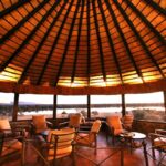 Mount Etjo accommodation – thatched common lounge with panoramic windows