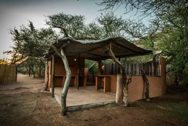 Namibia safari lodge – private campsite shelter among trees