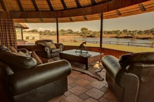 Namibia safari lodge – covered lounge overlooking the waterhole