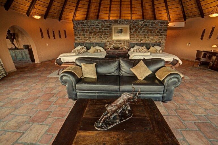 Namibia safari lodge – round thatched villa lounge