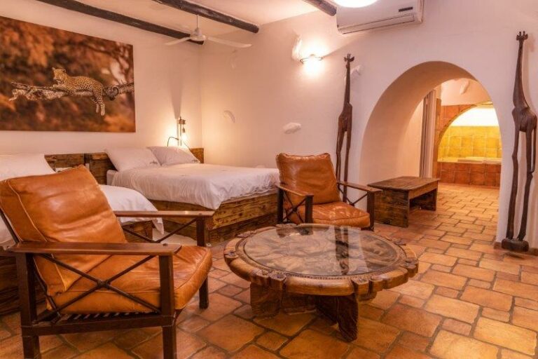 Okonjati Game Reserve lodge – large guest suite with separate sitting area