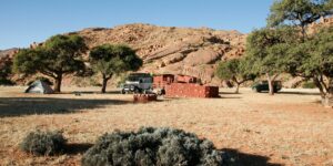 Namtib Biosphere Reserve – campsite below rocky mountains