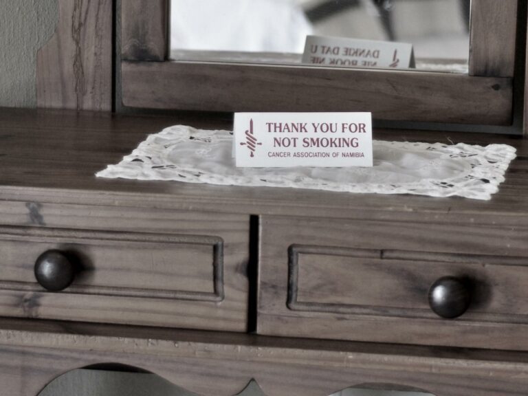 Obelix Guesthouse – non-smoking notice and dresser