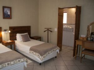 Obelix Guesthouse – twin room and en-suite doorway